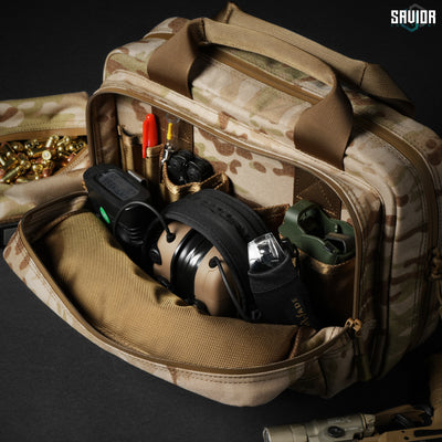 Spacious Pocket - Looks can be deceiving when it comes to the size of our front admin pocket. We'll have room for all your essentials. Firearms & accessories shown not included.