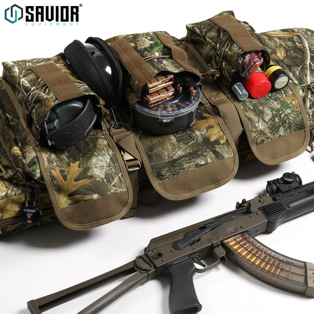 Room For It All - Spacious enough to easily store magazines, ears and eyes, and cleaning kits. Lockable zipper heads integrated into both firearm compartments. Accessories shown not included.#color_realtree-edge