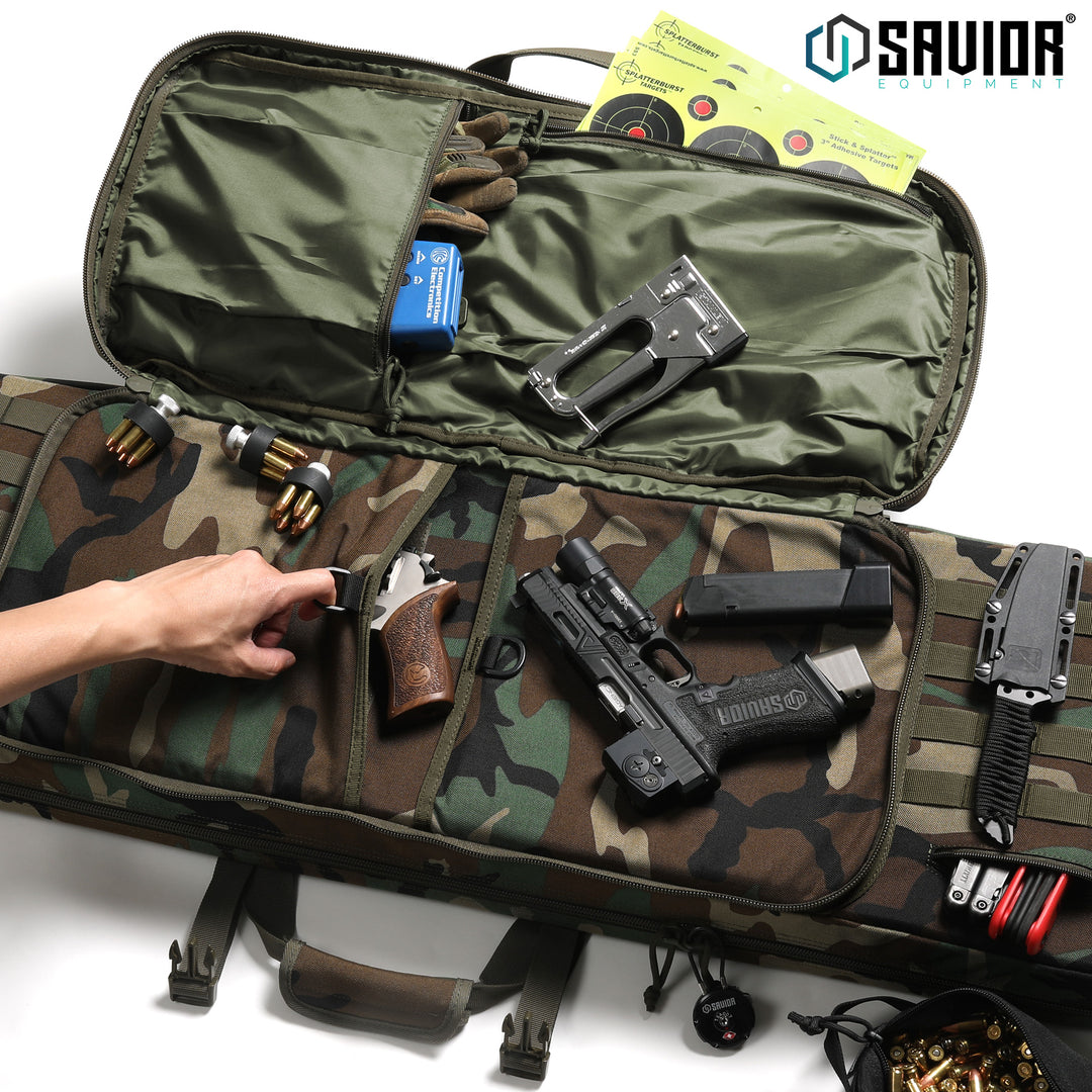 Fits Two Pistols - D-ring pull tabs make it simple to access the large padded pistol sleeve. Store accessories in the zippered sleeves located on the cover. Accessories shown not included.#color_m81-woodland