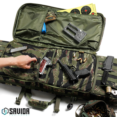 Fits Two Pistols - D-ring pull tabs make it simple to access the large padded pistol sleeve. Store accessories in the zippered sleeves located on the cover. Accessories shown not included.#color_tiger-stripe