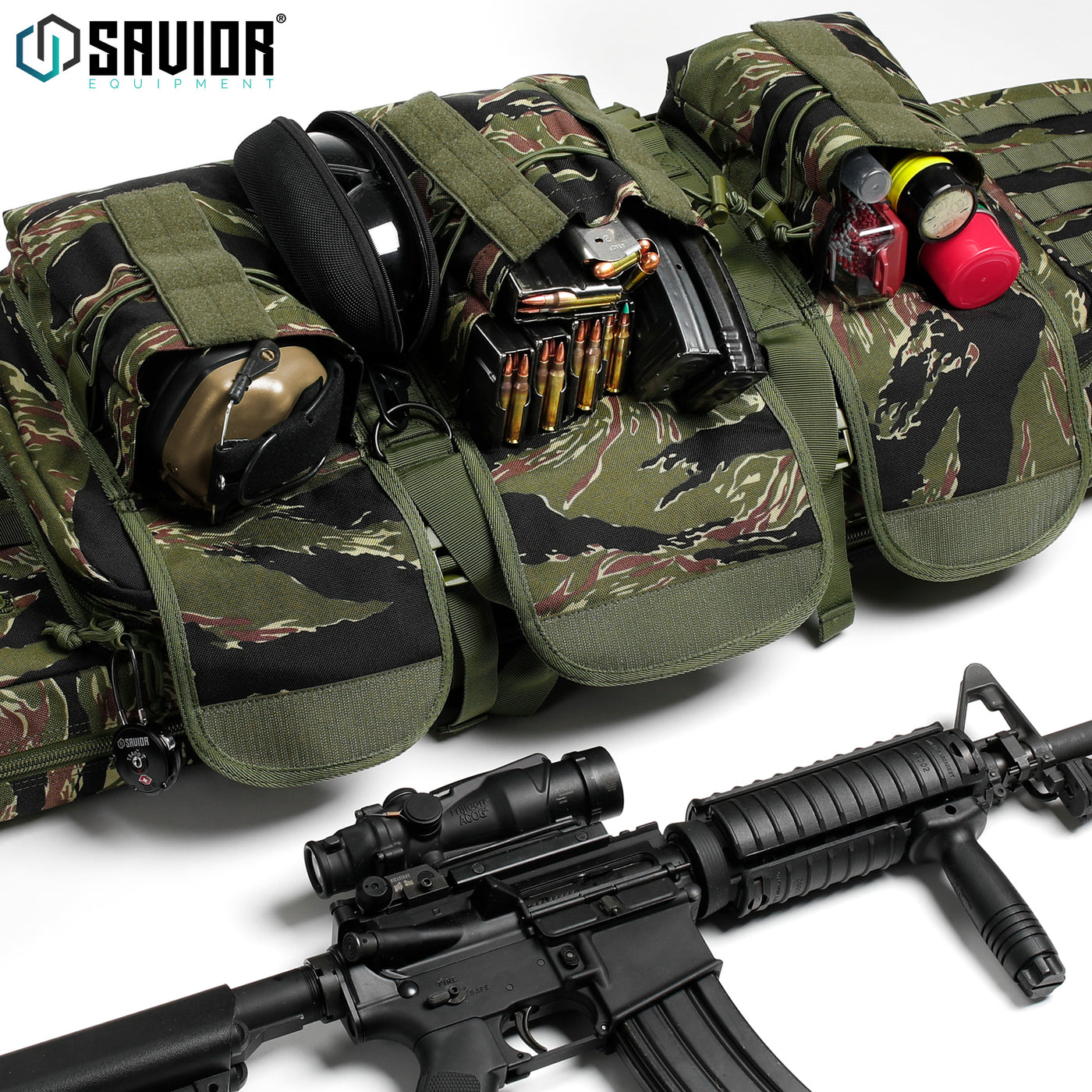Room For It All - Spacious enough to easily store magazines, ears and eyes, and cleaning kits. Lockable zipper heads integrated into both firearm compartments. Accessories shown not included.#color_tiger-stripe