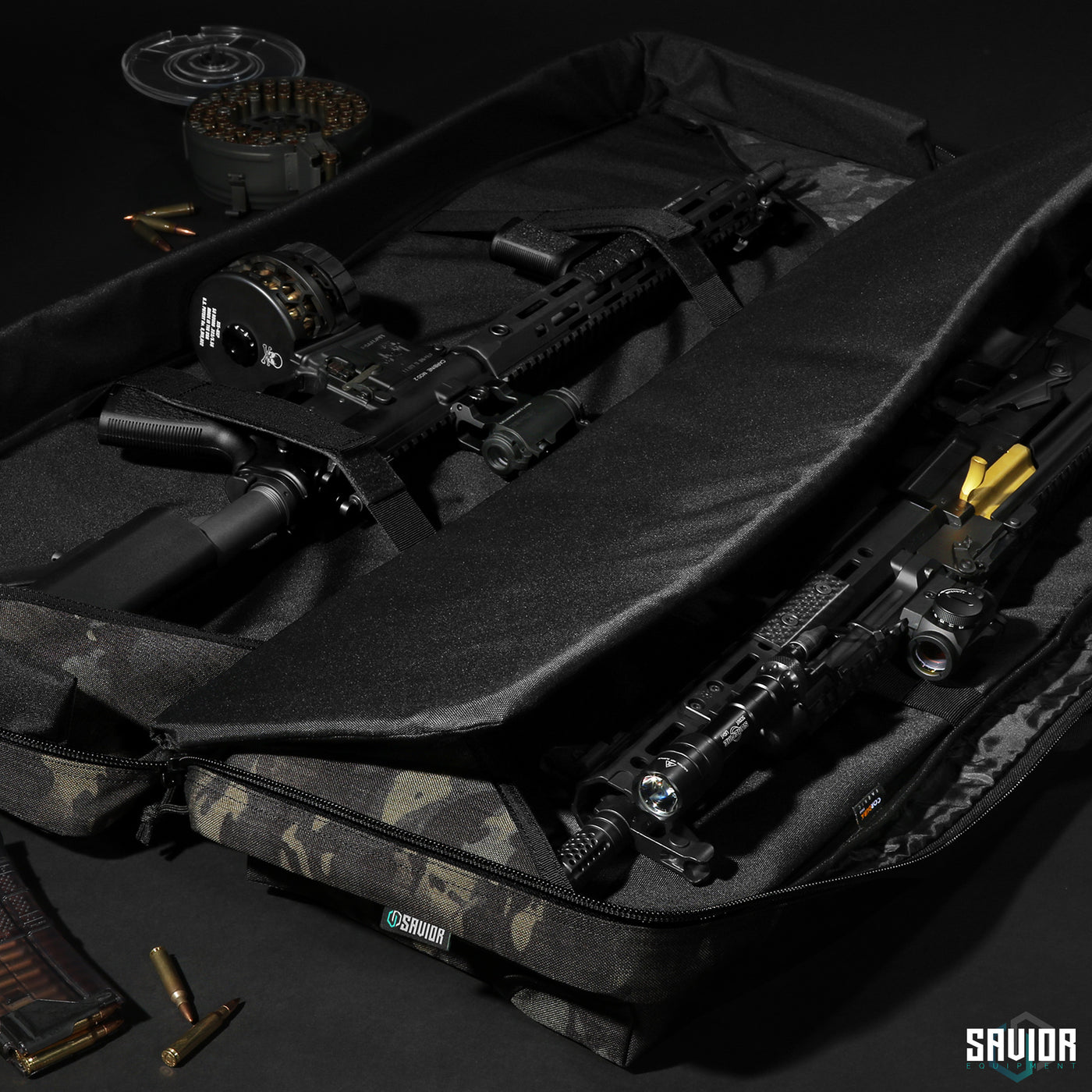 Double Rifle Slots - 1000D Multicam fabric interior. Extra padding for all-around protection. Straps to lockdown your firearms during transportation. Firearms shown not included.