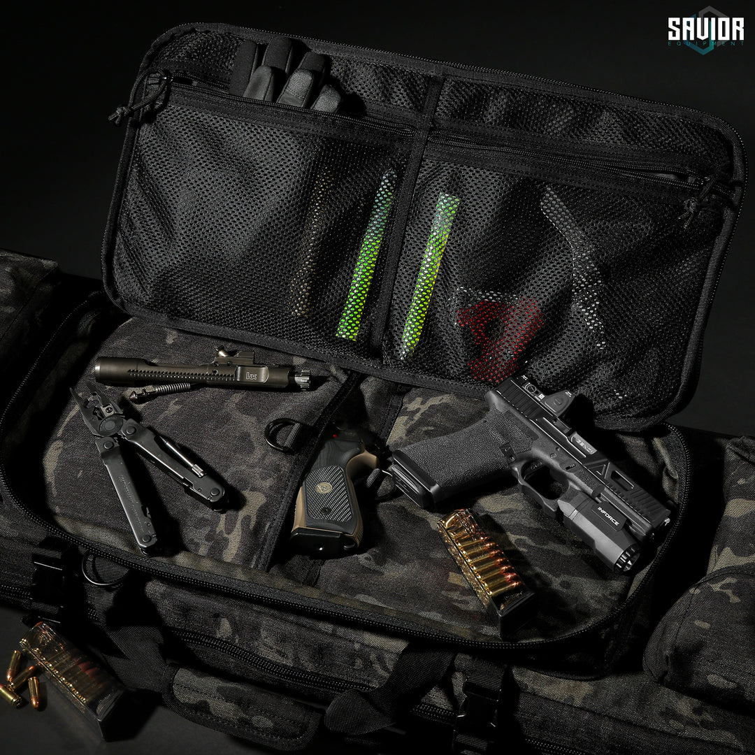 Dual Pistol Pockets - Large padded sleeves with hook & loop fastener strips. Store any additional accessories in the upgraded mesh pockets. Firearm & accessories shown not included.#color_multicam-black