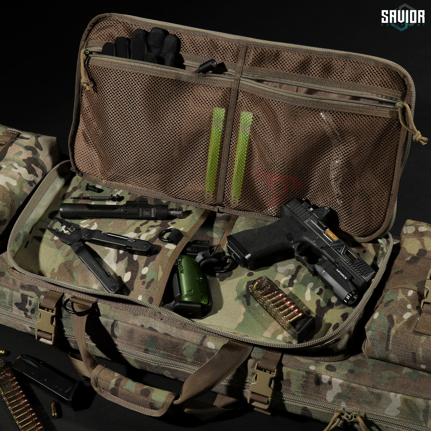 Dual Pistol Pockets - Large padded sleeves with hook & loop fastener strips. Store any additional accessories in the upgraded mesh pockets. Firearm & accessories shown not included.#color_multicam