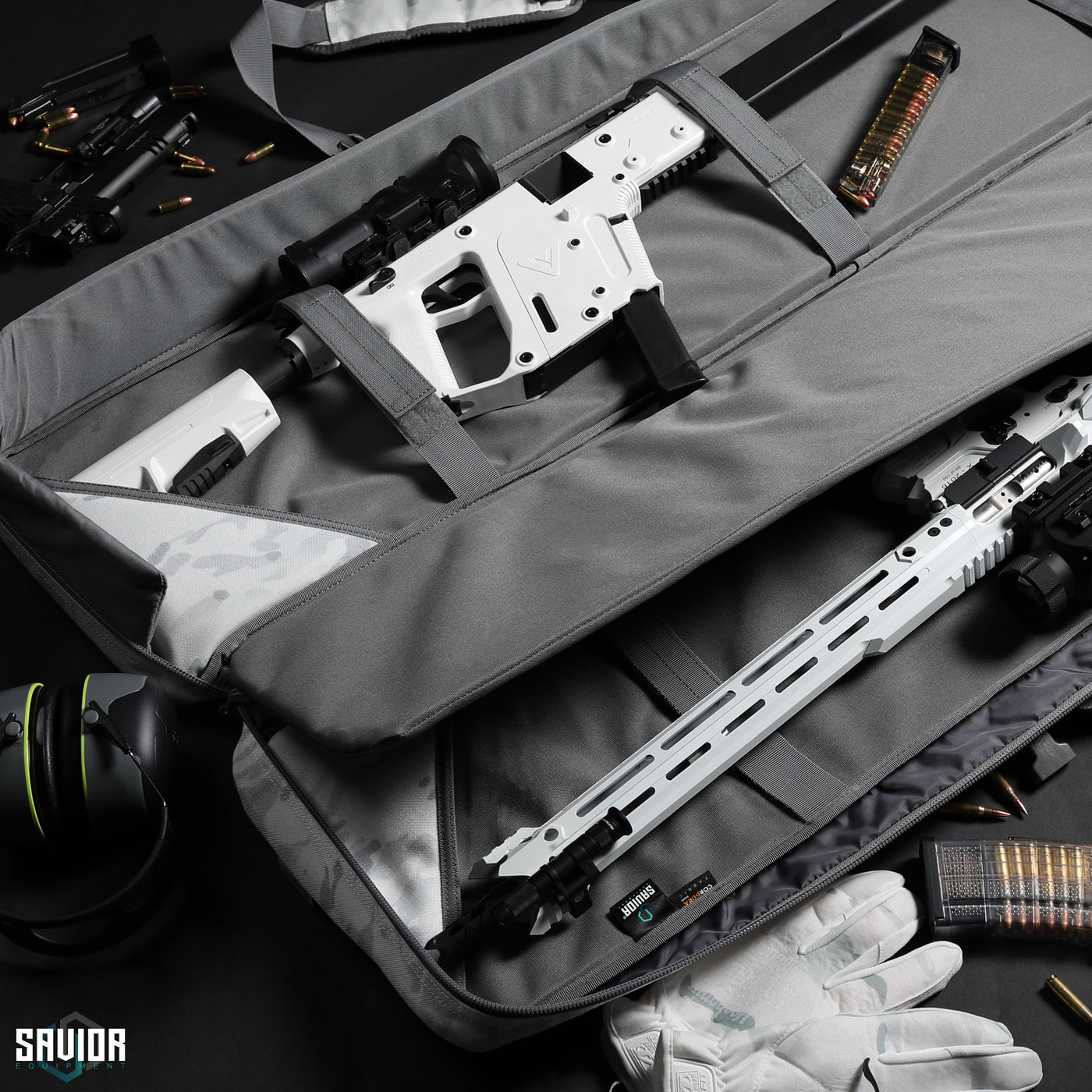 Double Rifle Slots - 1000D Multicam fabric interior. Extra padding for all-around protection. Straps to lockdown your firearms during transportation. Firearms shown not included.#color_multicam-alpine